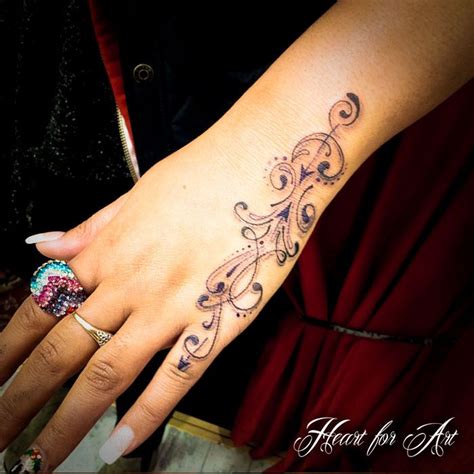 tattoo designs for girls on hand|side hand tattoo designs female.